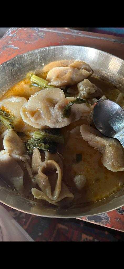 <b>Thukpa is the main dish of Ladakh. This is a healthy dish with pieces of dough cooked in a soup or broth with vegetables and greens that boil along with it, and very mildly spiced. </b>