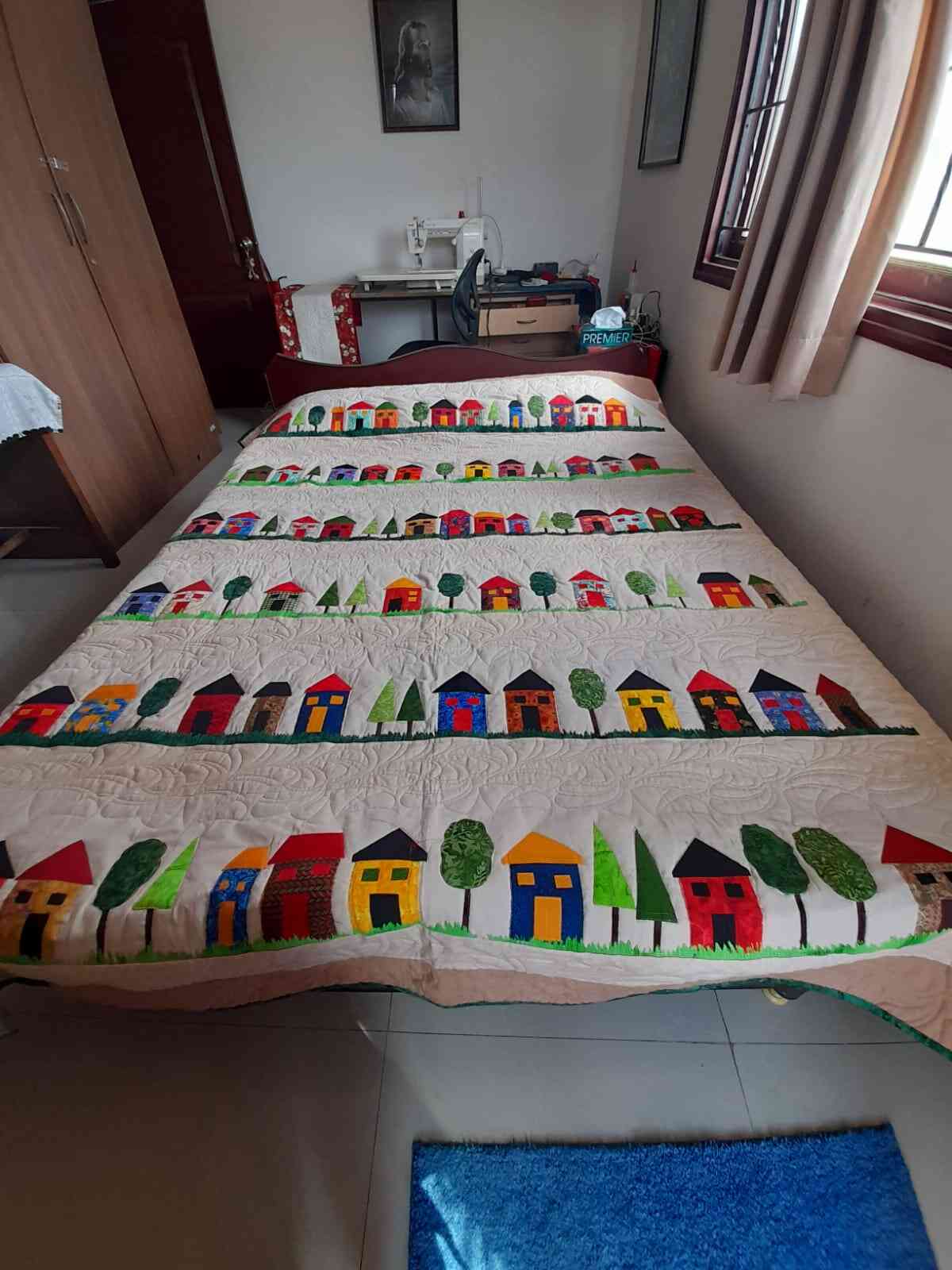 An applique bedsheet by Romla Thomas
