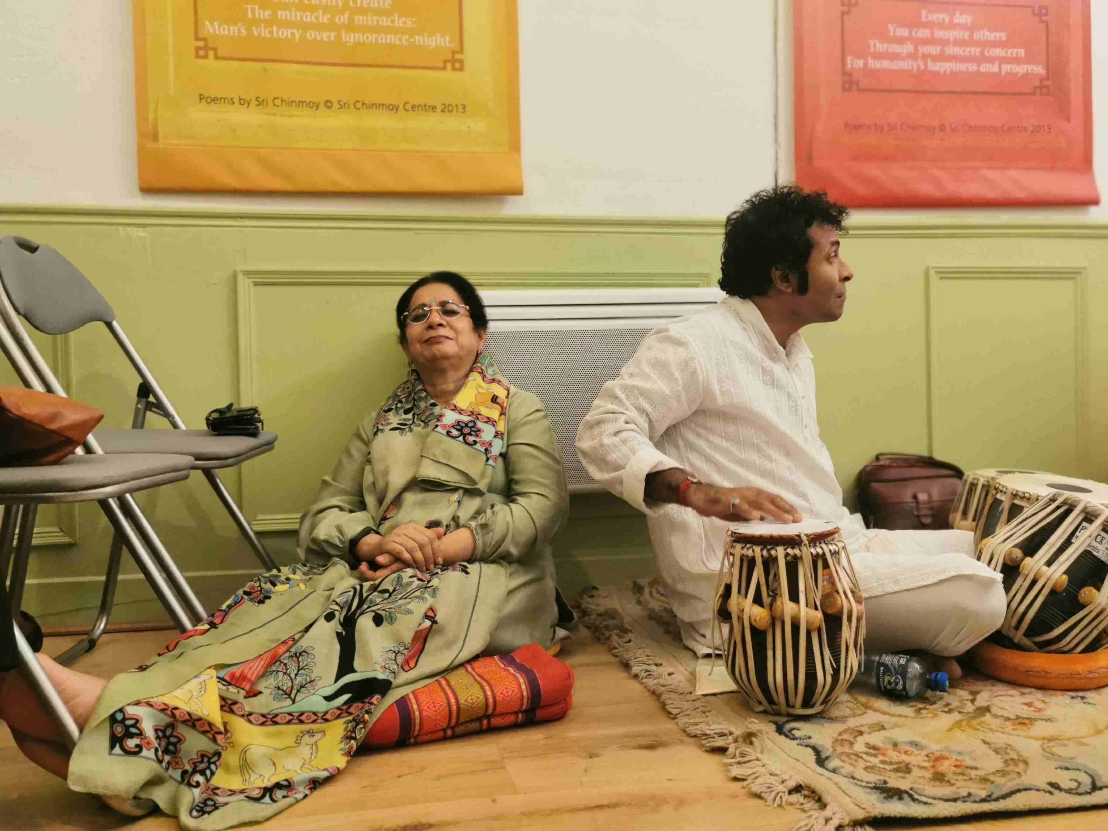 At the Gandharva Loka - World Music Store in Dublin, Yameema Mitha enjoys a recital, while tabla maestro Debojyoti Sanyal waits for his cue from another artist. (Photo Credit: Priyanka Borpujari)