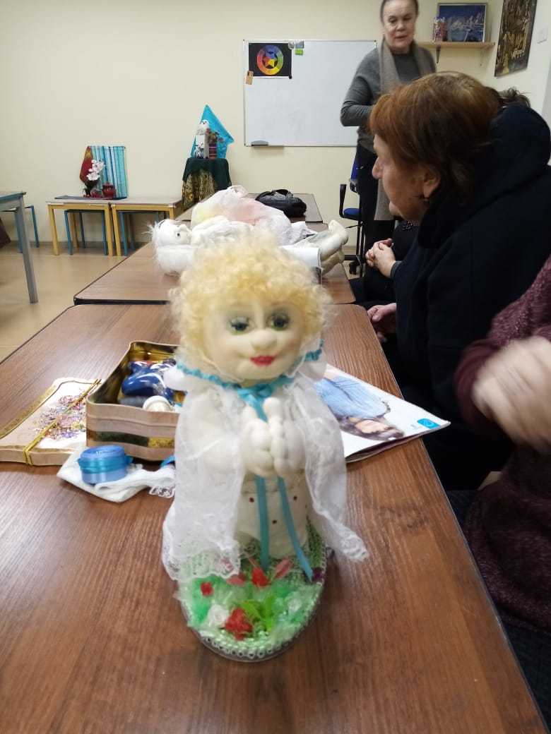 <i><b>Lyudmila loves craft and is attending a doll-making class. A doll made by her</b></i>